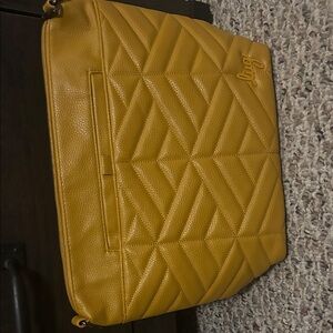 Lug Quilted Crossbody Bag in Mustard